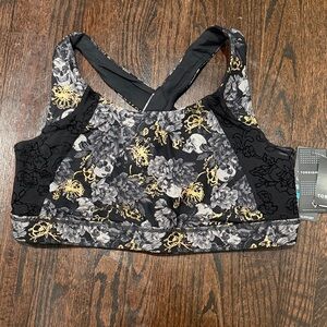 Torrid Black and Gold Floral Sports Bra size 2